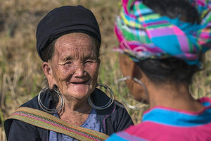 Great grandmother keeps the spirit while family works in the field